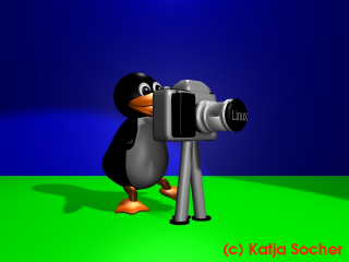 tux with camera